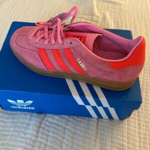 Brand new never been worn Gazelle in beam pink/solar red. Size 7